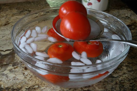 Plunge steamed tomatoes into ice water to remove skins with Tomato Dirt